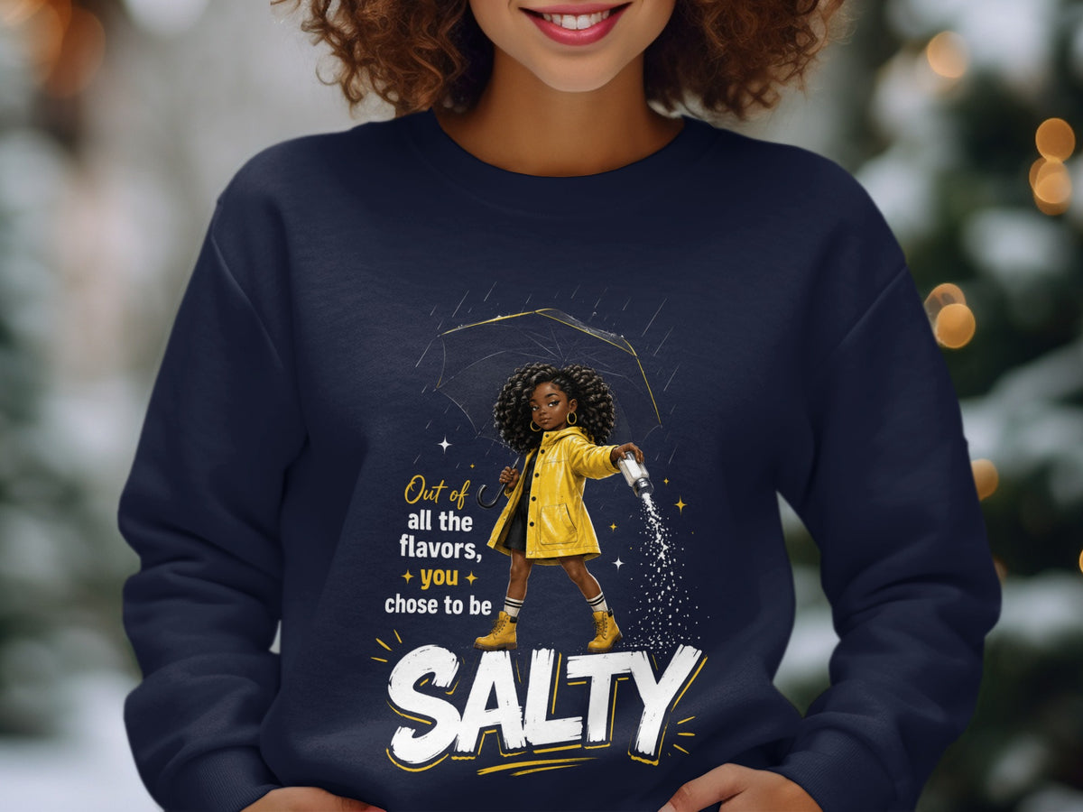 Dark navy sweatshirt with graphic of a girl holding an umbrella and shaking salt.