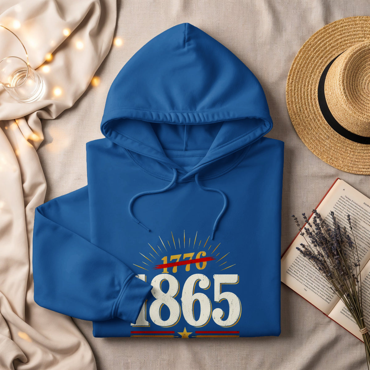 Blue hoodie with "1776" crossed out over "1865" graphic.
