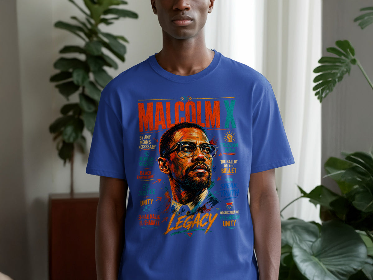 Blue t-shirt with Malcolm X portrait and text: "Malcolm X Legacy," "By Any Means Necessary," "Human Rights," "Black Empowerment," "Justice," "Unity," "El-Hajj Malik El-Shabazz," "Freedom Now," "The Ballot or The Bullet," "Speak Truth," and "Organization of Afro-American Unity."