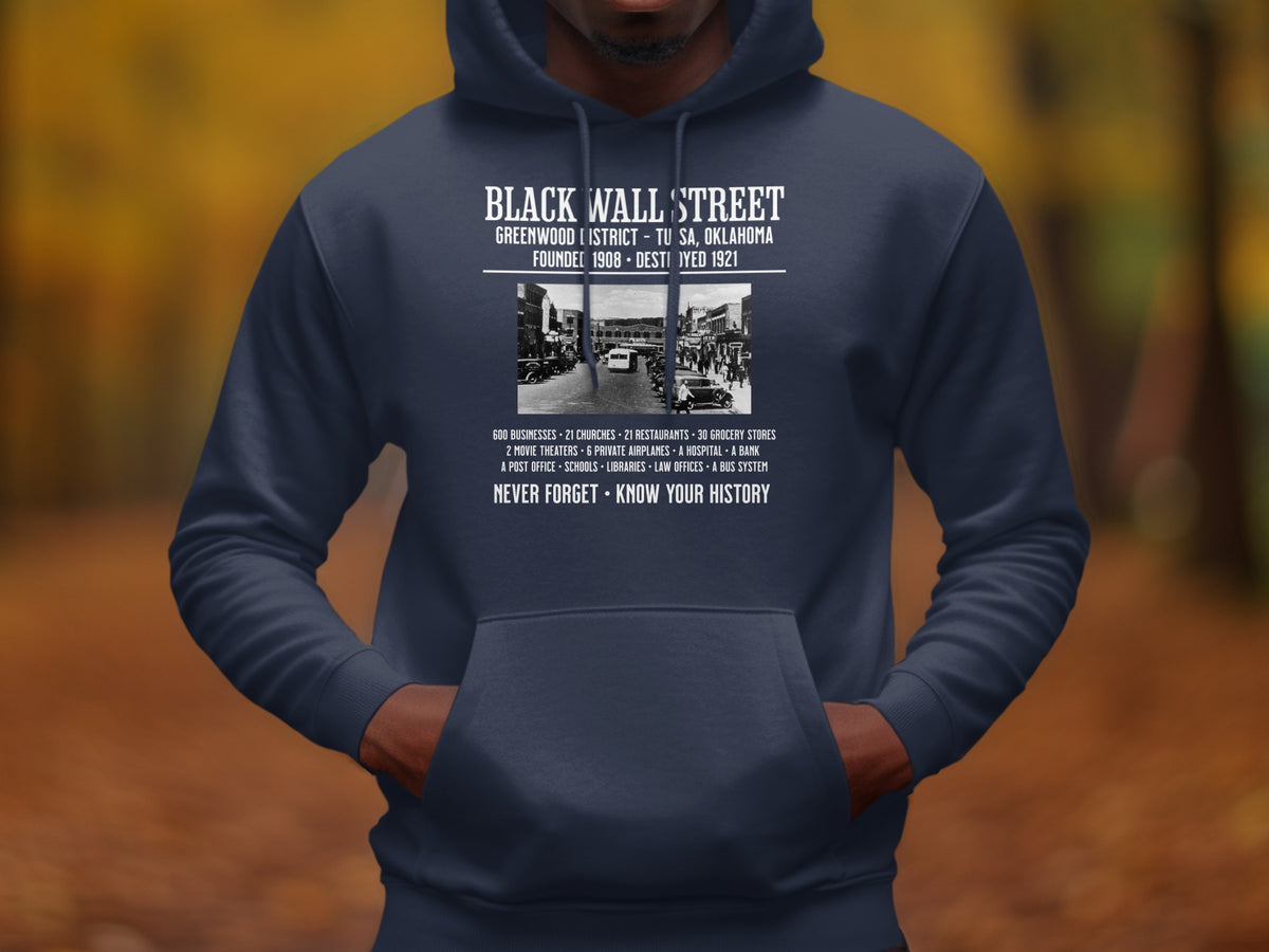 Black Wall Street design on a navy hoodie featuring historical text and image.