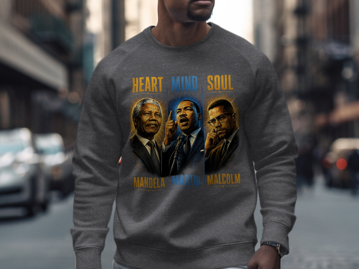 Mandela, Martin, and Malcolm portraits on a gray sweatshirt with text.