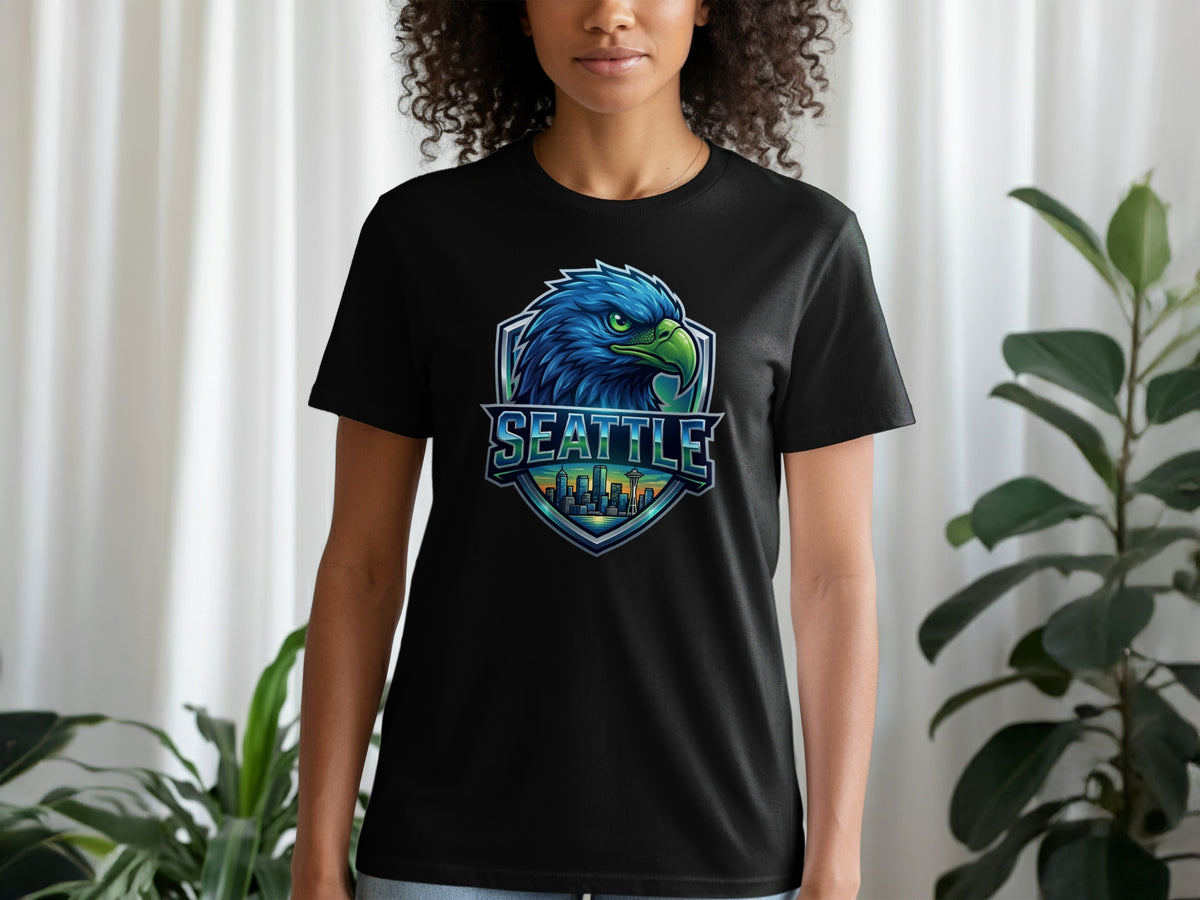 Black t-shirt with a blue eagle logo and "SEATTLE" text over a cityscape.