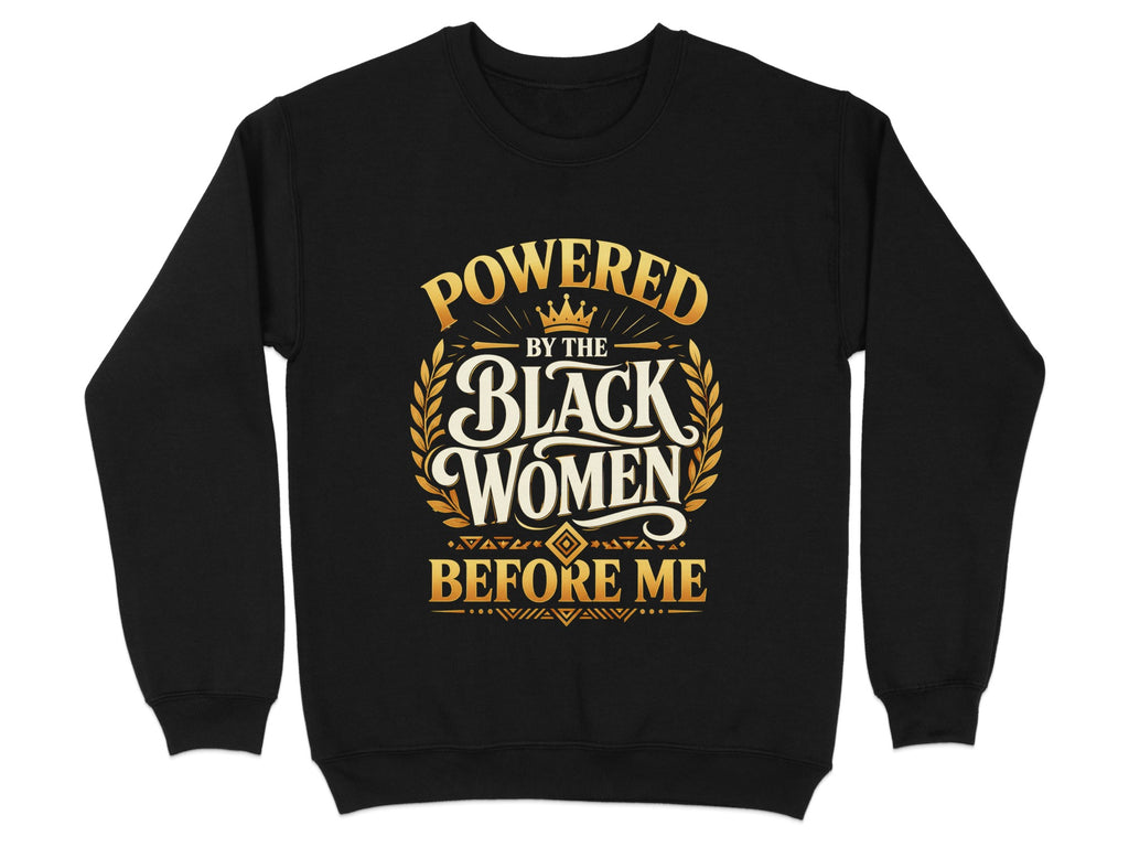 Black sweatshirt with gold text "Powered by the Black Women Before Me".