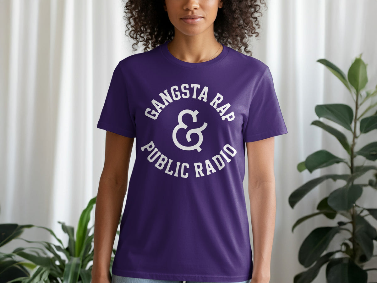 Purple t-shirt with white text "Gangsta Rap & Public Radio" centered.