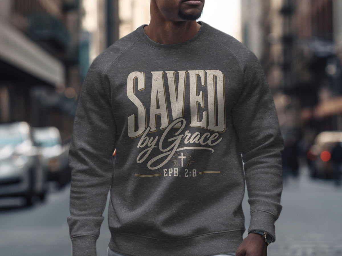 Dark grey sweatshirt with "SAVED by Grace" and "EPH. 2:8" text.
