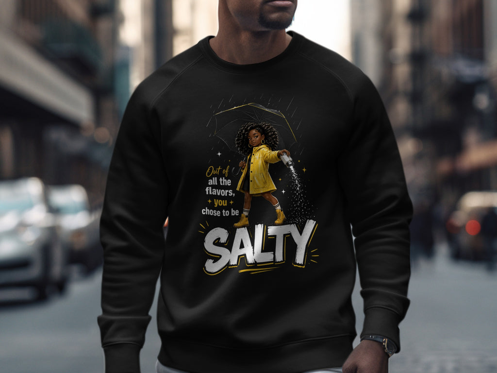 Black sweatshirt with illustration of girl holding umbrella and salt shaker, text reads "SALTY".