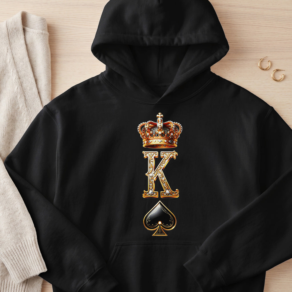 Black hoodie with king card design featuring a crown, ornate K, and spade.