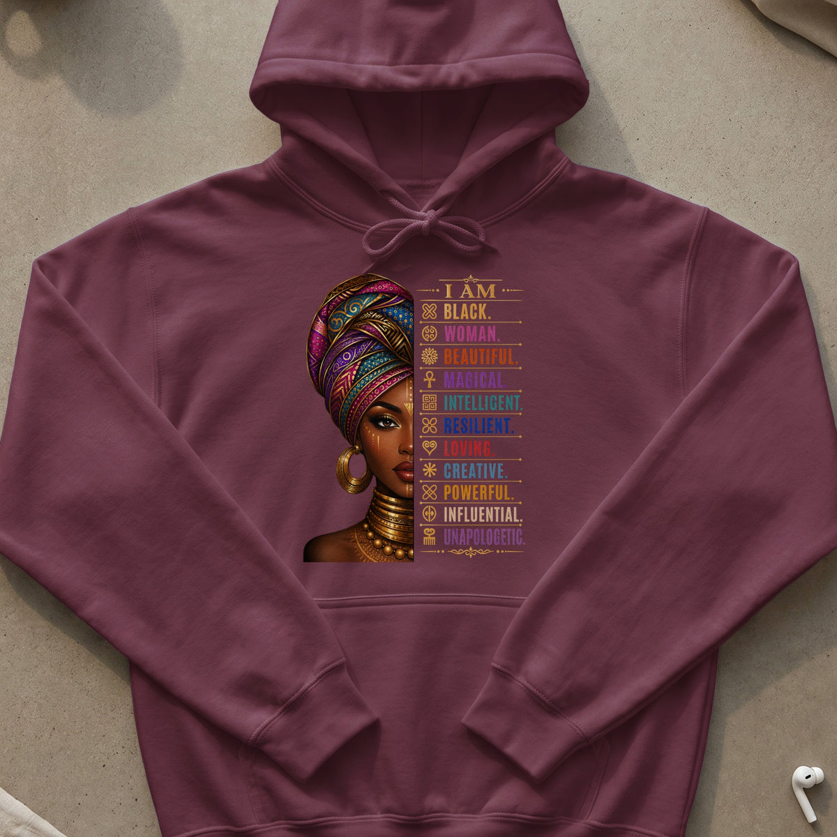 Maroon hoodie with a graphic featuring a woman's face and "I AM BLACK. WOMAN." text.