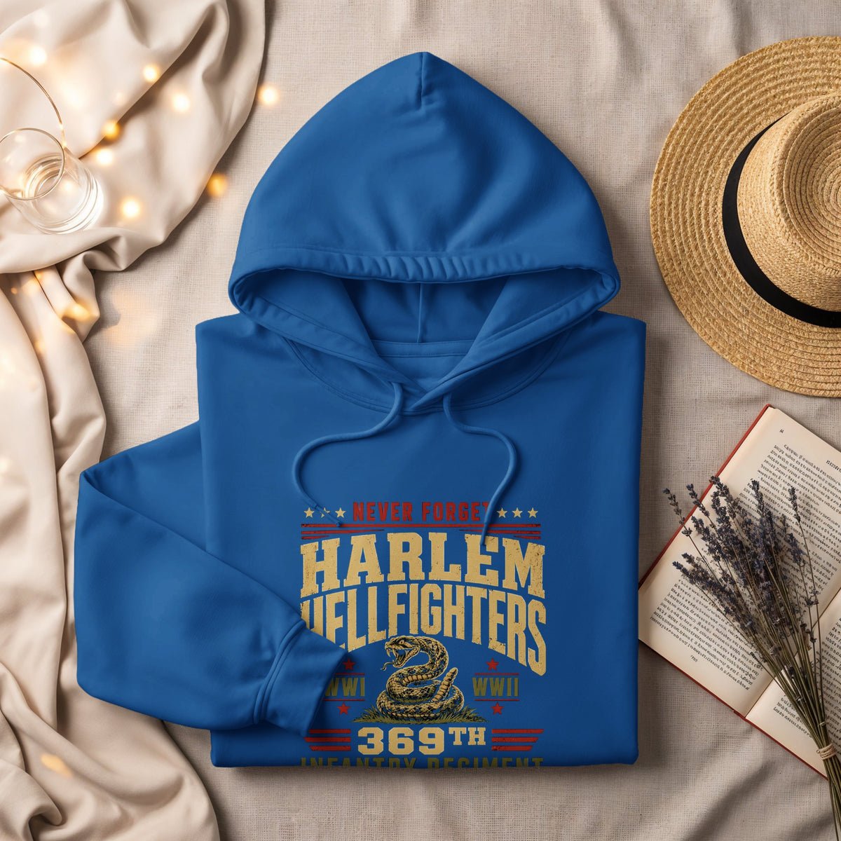 Blue hoodie with "Harlem Hellfighters" text, snake emblem, and "369th Infantry Regiment."