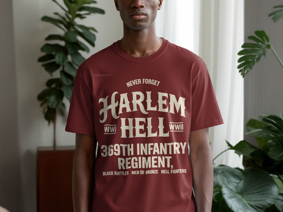 Maroon t-shirt with text: Never Forget Harlem Hellfighters 369th Infantry Regiment, WWI, WWII.