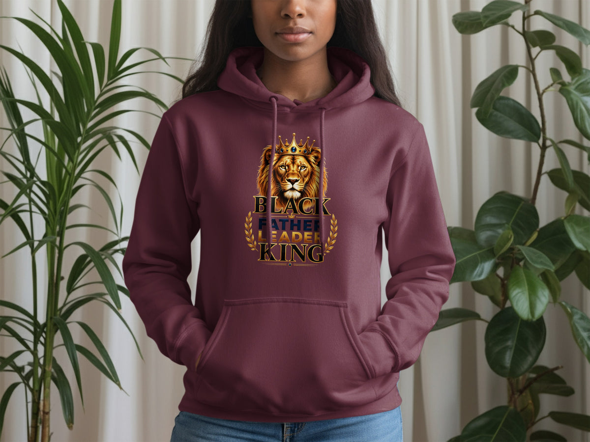 Maroon hoodie with a lion wearing a crown and the text "BLACK FATHER LEADER KING".