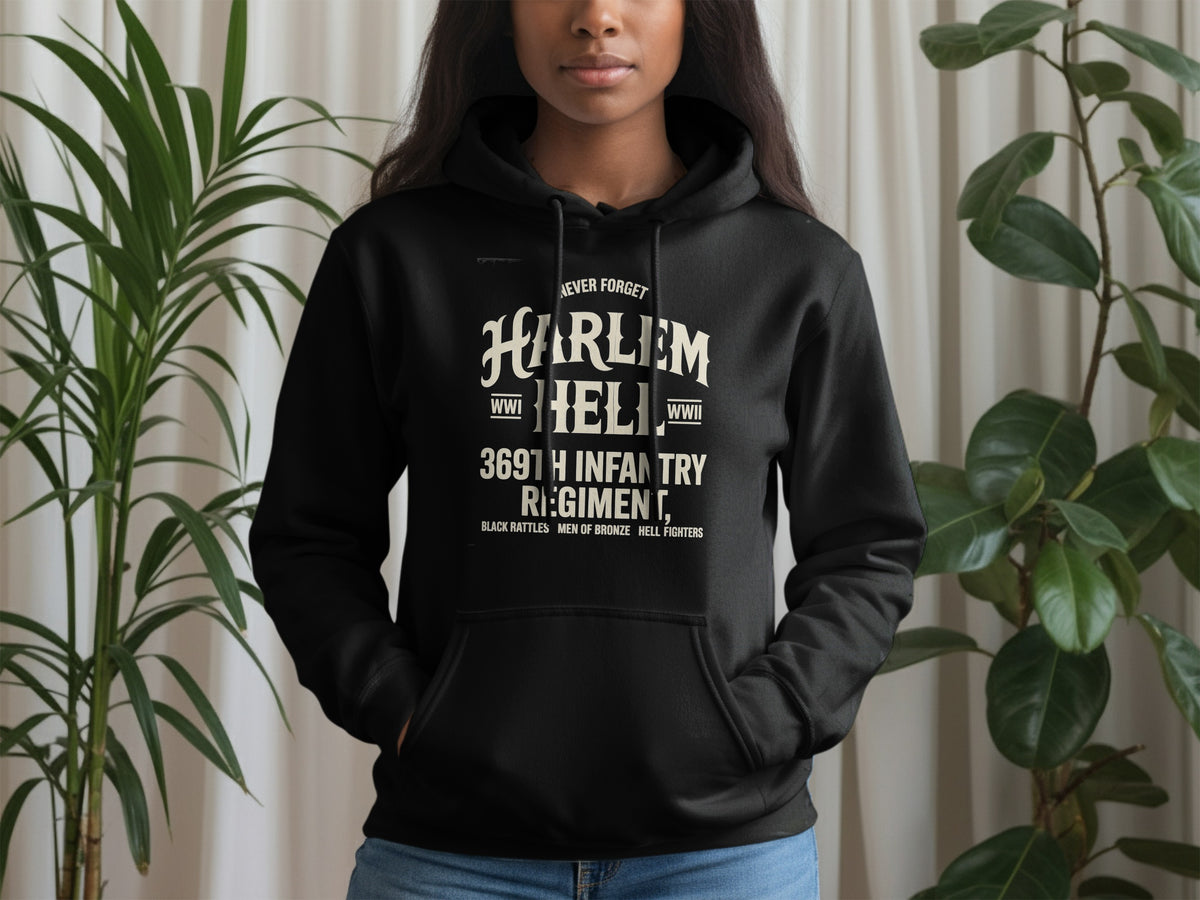 Black hoodie with "Harlem Hellfighters" WWI & WWII text and regiment details.
