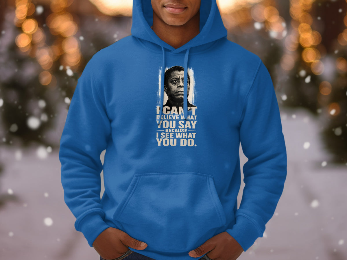 Blue hoodie with James Baldwin portrait and quote: "I can't believe what you say because I see what you do."