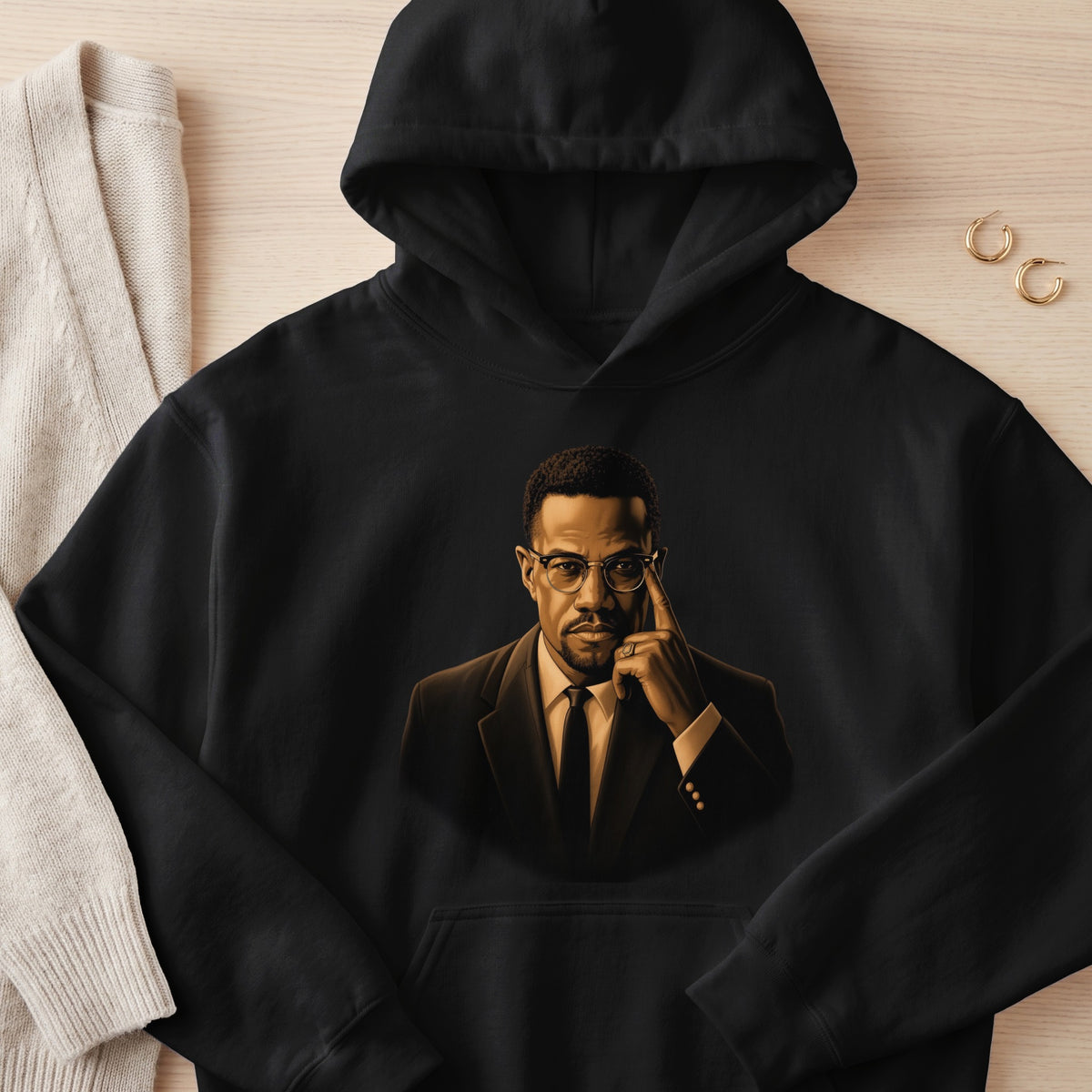 Black hoodie with graphic print of a man in a suit and glasses.