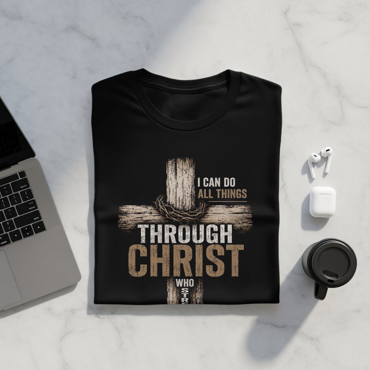 Black t-shirt with a wooden cross, crown of thorns, and text "I CAN DO ALL THINGS THROUGH CHRIST WHO STRENGTHENS ME".