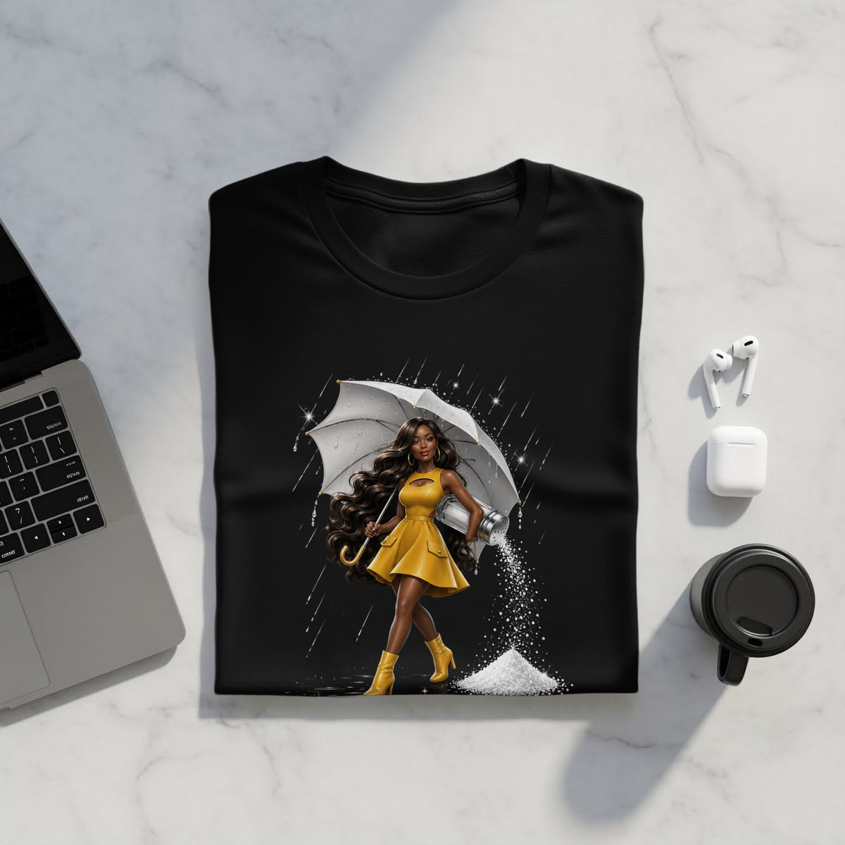 Black t-shirt featuring a woman in a yellow dress under an umbrella, shaking salt from a shaker.