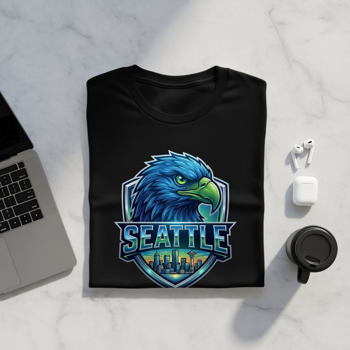 Black t-shirt with a blue eagle logo and Seattle skyline graphic.