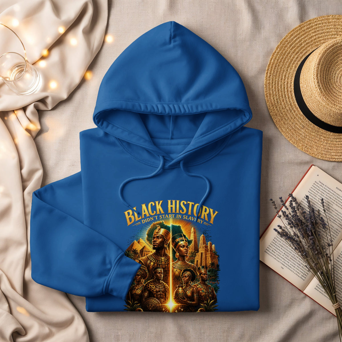 Blue hoodie with "Black History Didn't Start in Slavery" graphic.