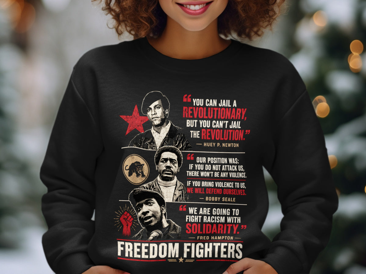Black sweatshirt with "Freedom Fighters" and quotes from Huey P. Newton, Bobby Seale, and Fred Hampton.