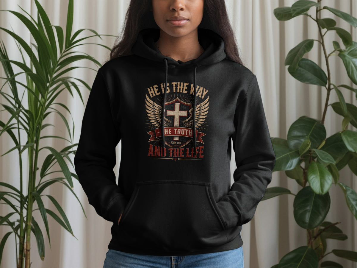 Black hoodie with "He is the way he truth and the life" text and cross graphic.