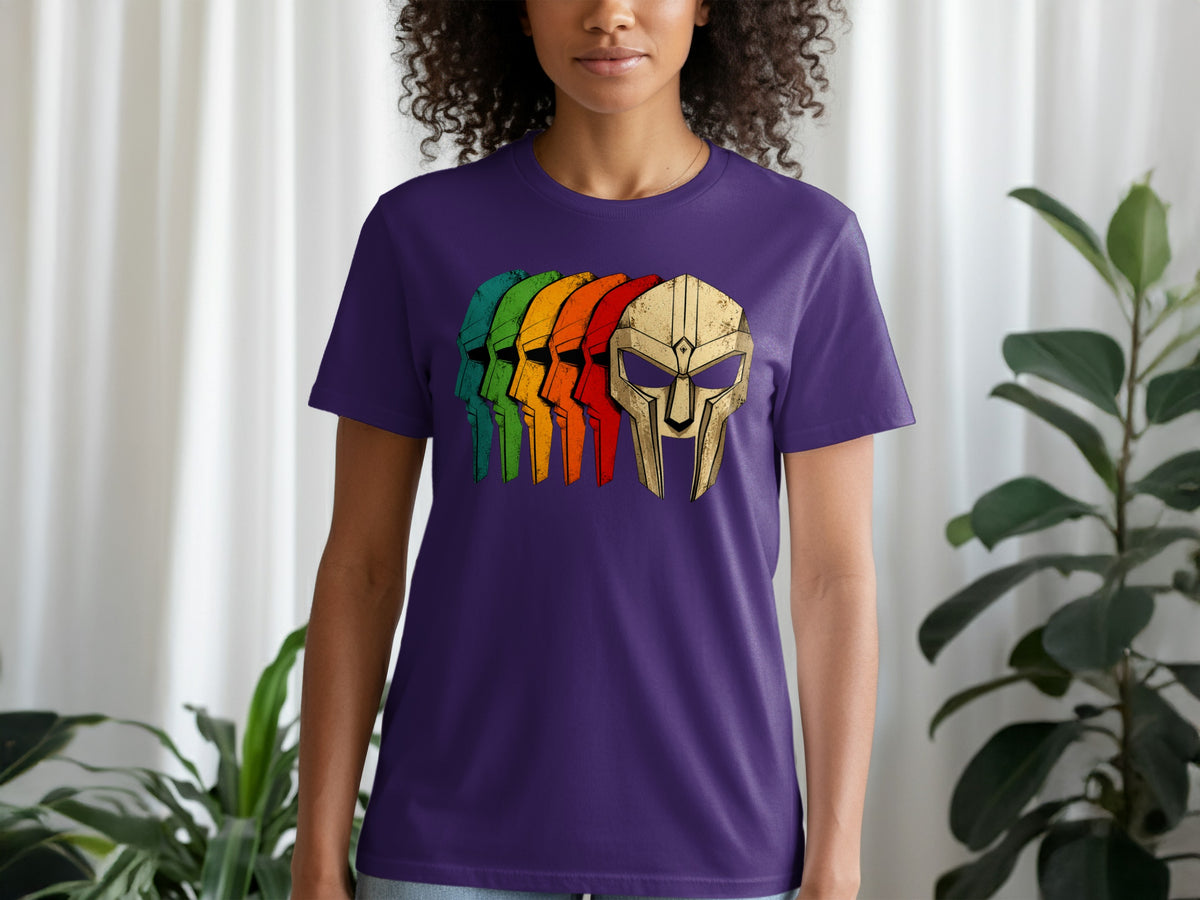 Purple t-shirt with a repeating metallic gold mask graphic in rainbow colors.