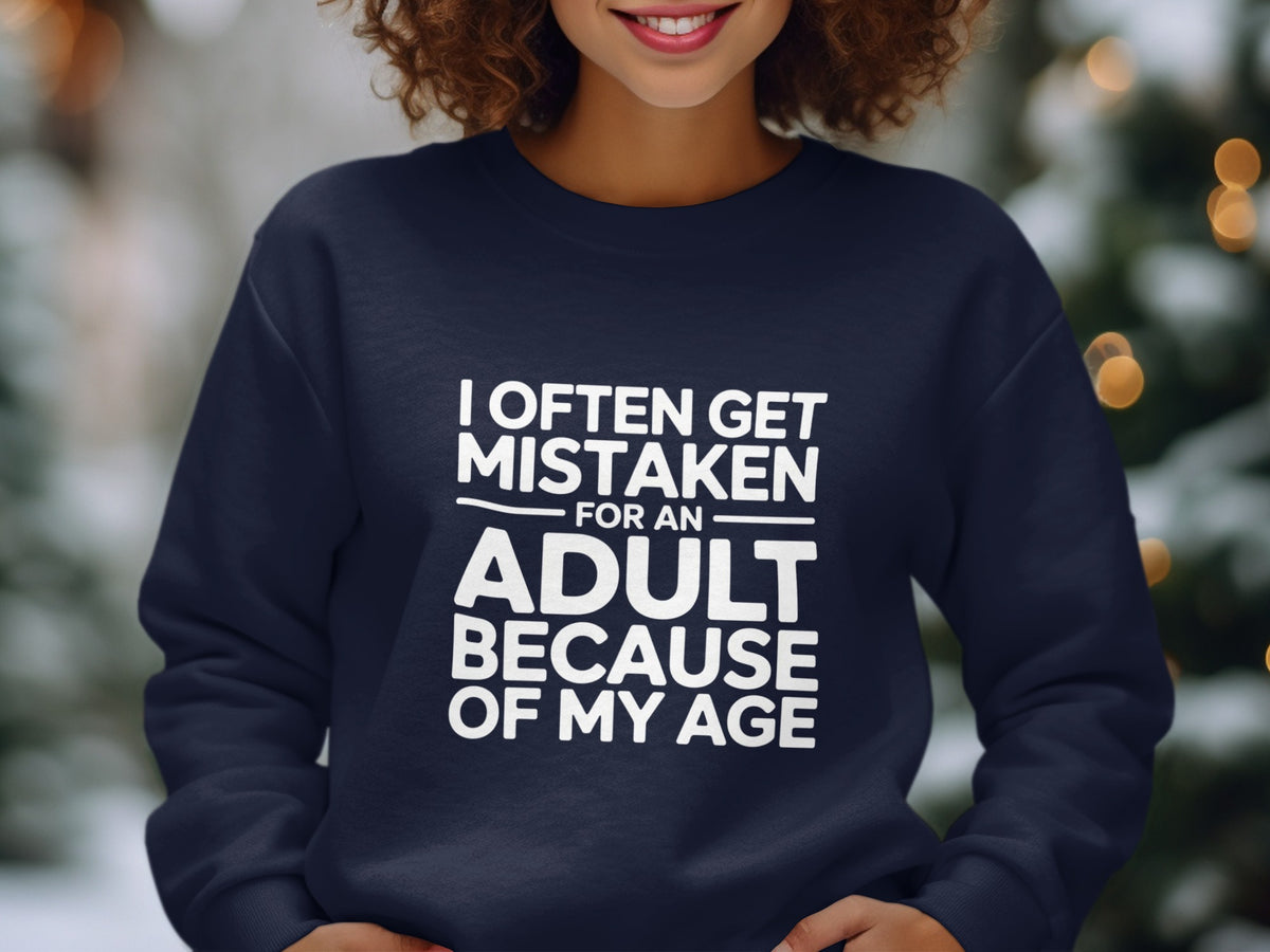 Navy sweatshirt with white text "I often get mistaken for an adult because of my age."