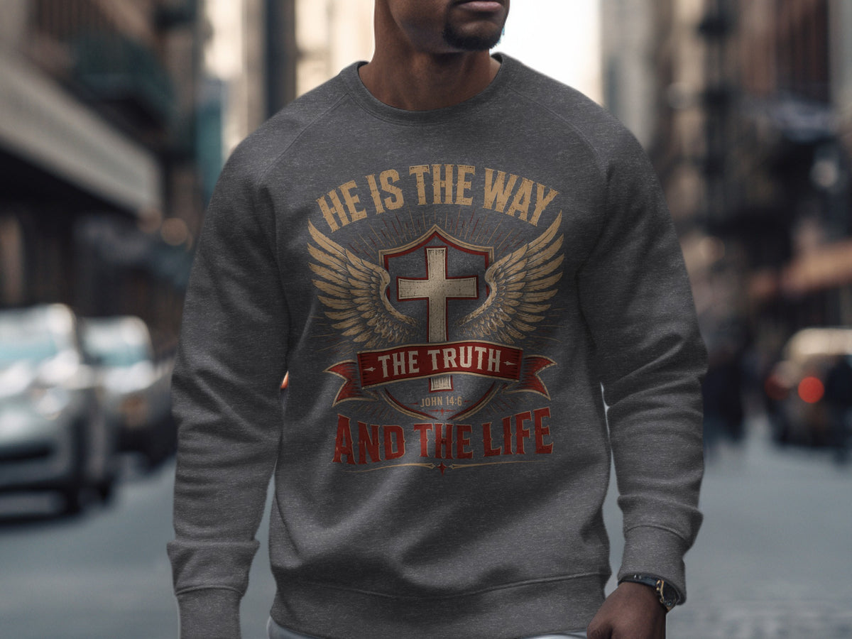 Dark grey sweatshirt with Christian cross and wings design: "He is the Way, The Truth, and The Life".