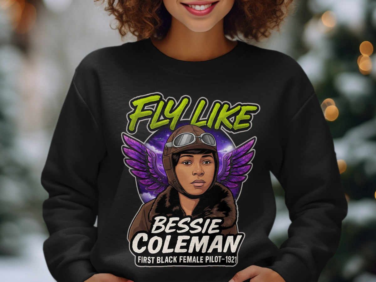 Black sweatshirt with "Fly Like Bessie Coleman First Black Female Pilot 1921" graphic.