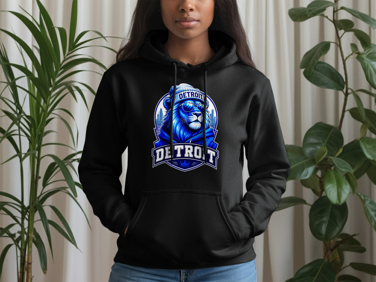 Black hoodie with a blue lion graphic wearing a beanie and sunglasses, with "DETROIT" text.