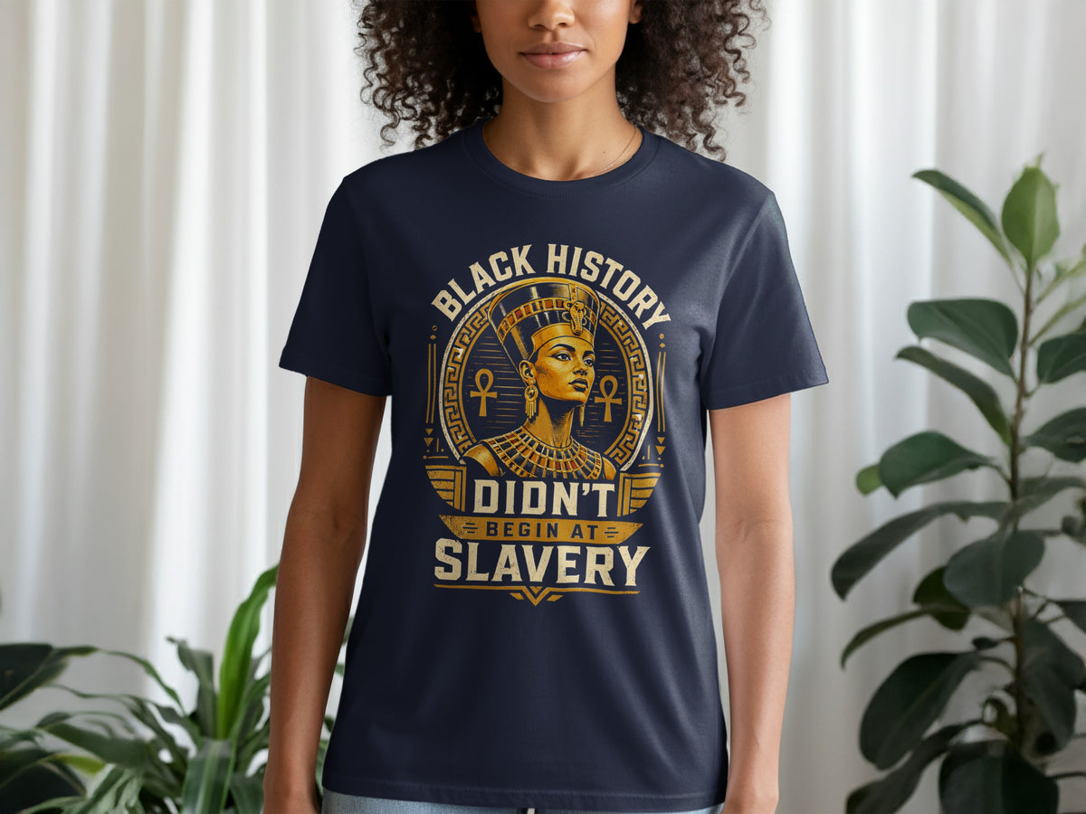 Dark blue t-shirt with gold text and Nefertiti design stating "Black History Didn't Begin At Slavery."