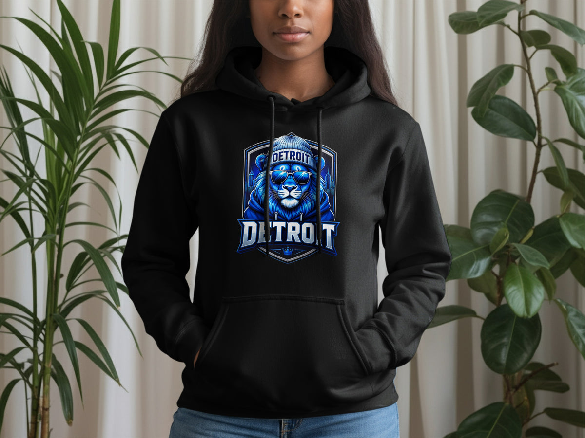 Black hoodie with a blue lion graphic wearing sunglasses and a beanie, text "DETROIT"