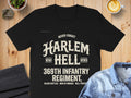 Black t-shirt with text: "Never Forget Harlem Hell 369th Infantry Regiment, Black Rattles".