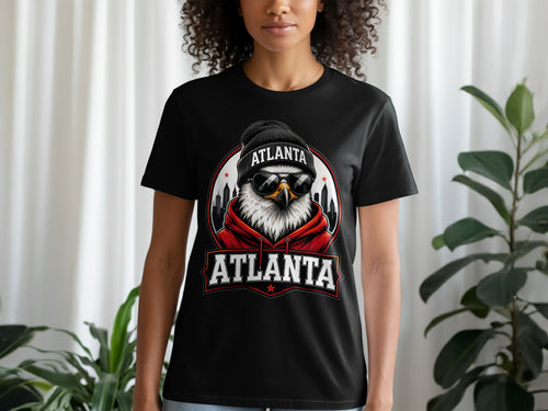 Black t-shirt with a graphic of an eagle wearing sunglasses and a beanie, with "Atlanta" text.