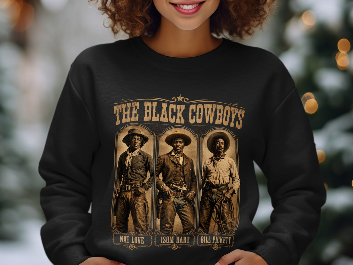Black sweatshirt with "The Black Cowboys" and Nat Love, Isom Dart, Bill Pickett portraits.