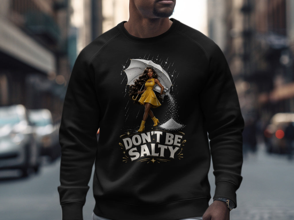 Black sweatshirt with "DON'T BE SALTY" graphic featuring a woman with umbrella and salt shaker.