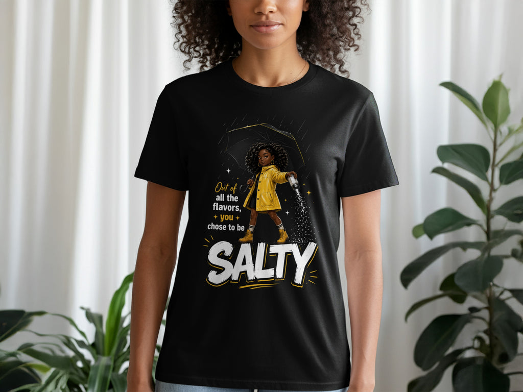 Black t-shirt with illustration of girl with umbrella, shaking salt and text "SALTY".