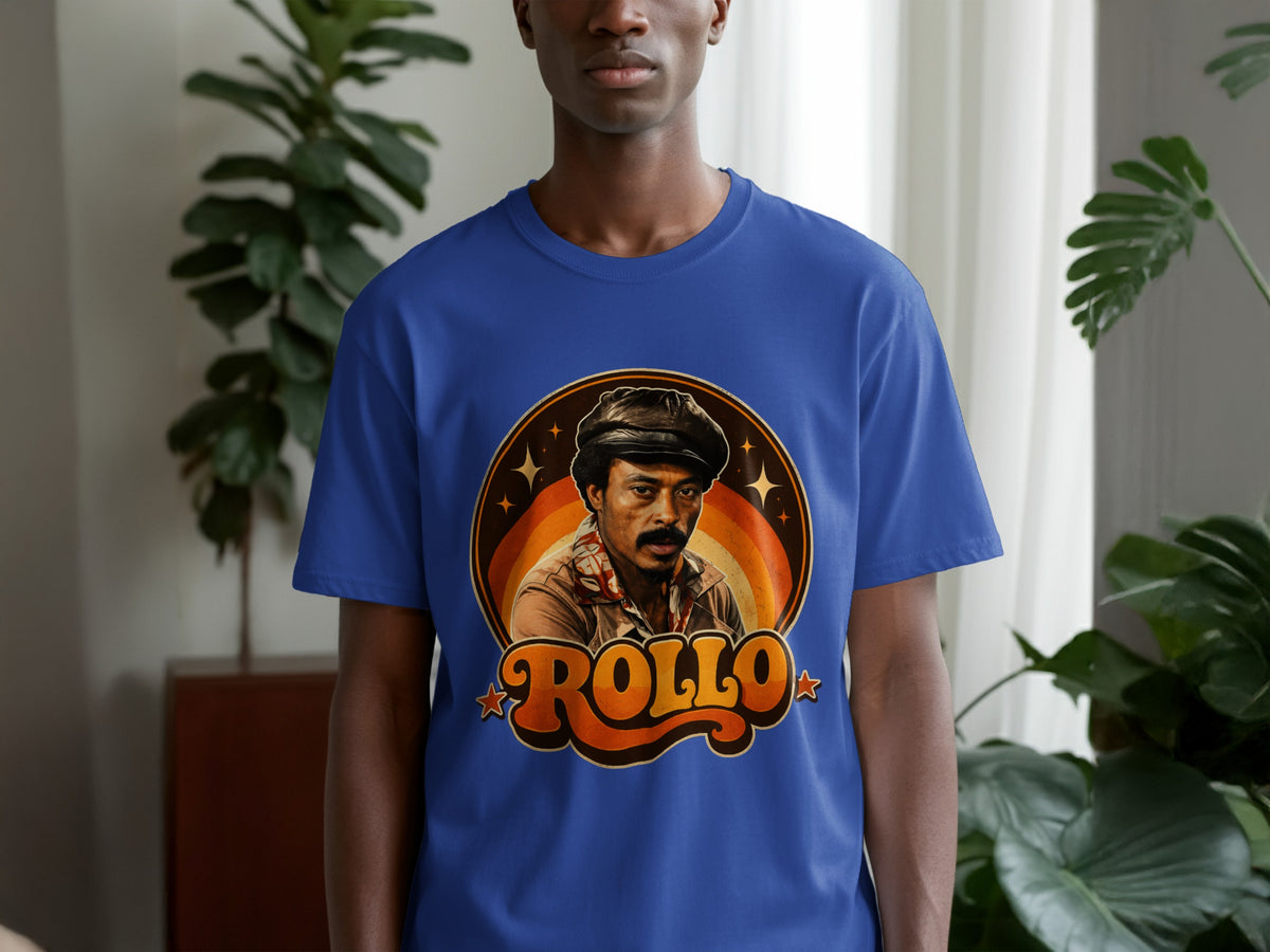 Blue t-shirt with vintage "Rollo" graphic featuring a man with a mustache.