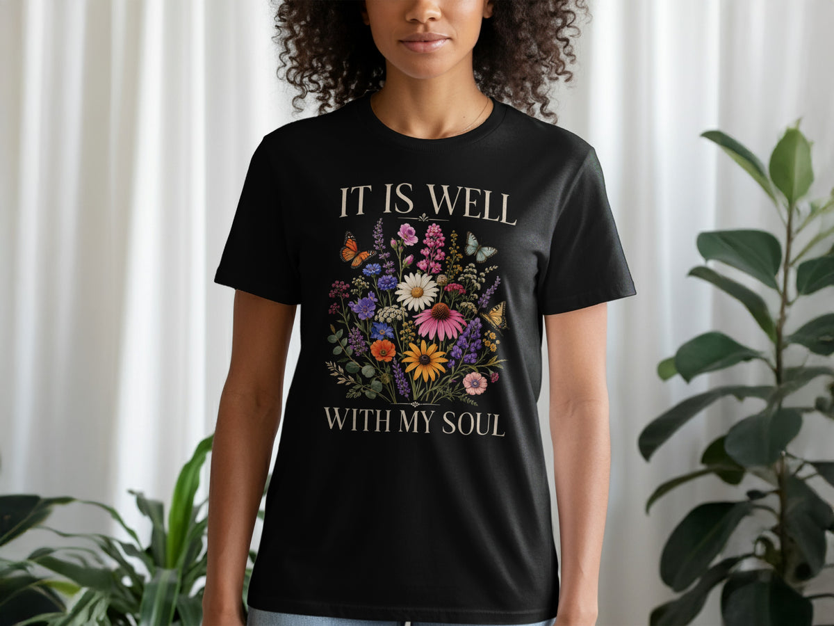 Black t-shirt with floral design and text "IT IS WELL WITH MY SOUL".