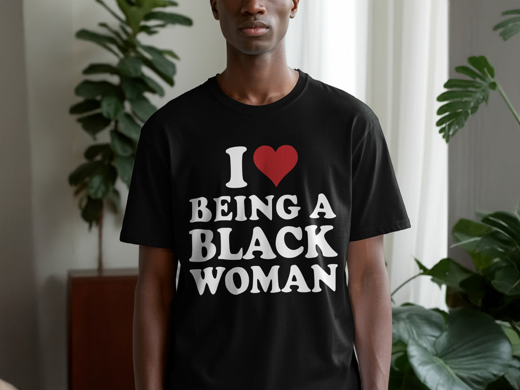 Black t-shirt with white text that reads "I Love Being A Black Woman" and a red heart.