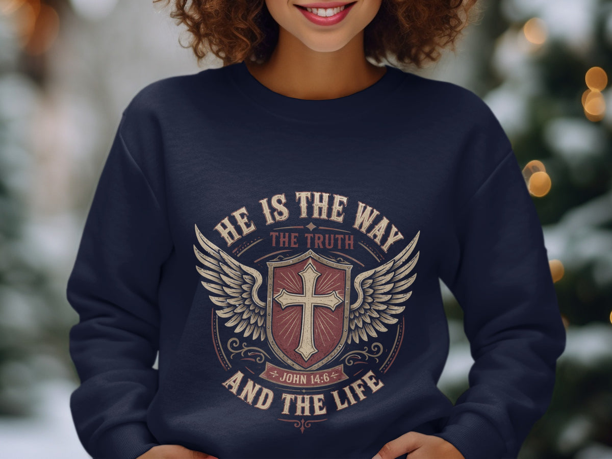 Navy sweatshirt with "He is the Way, The Truth, and The Life John 14:6" text and a cross emblem.
