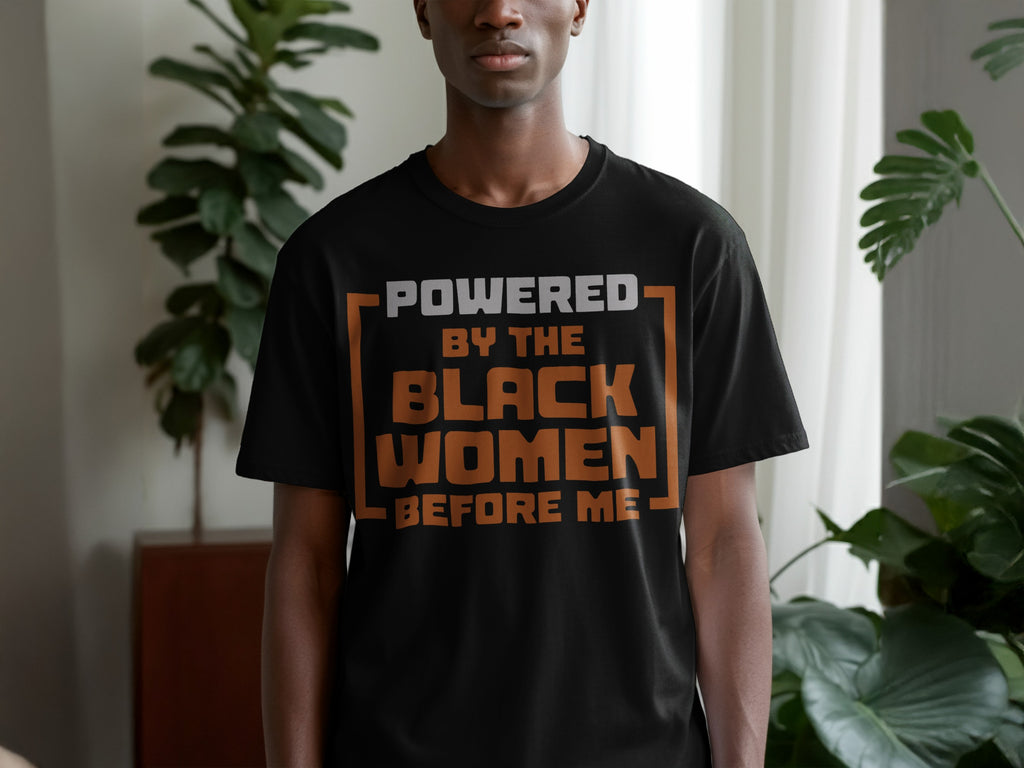 Black t-shirt with text "Powered by the Black Women Before Me"