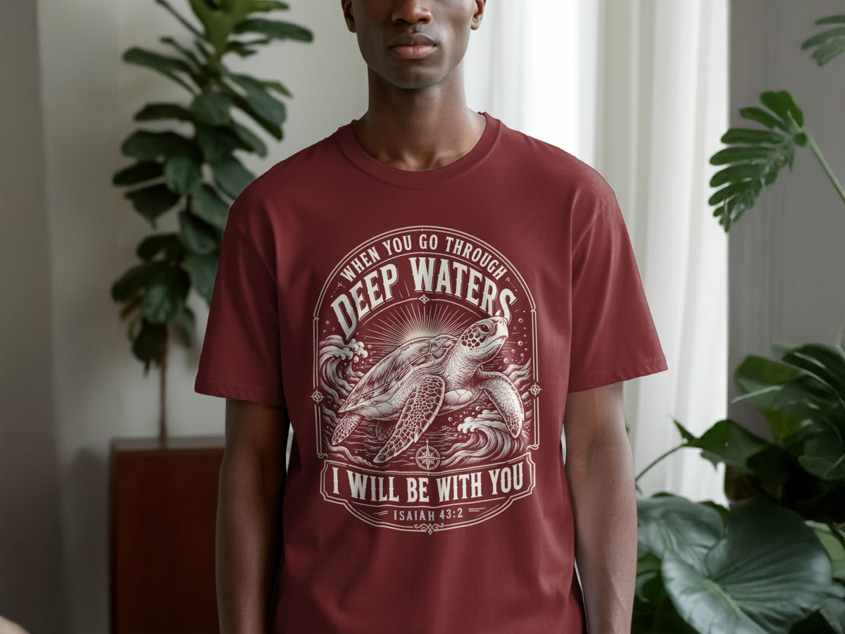 Maroon t-shirt with a sea turtle and waves design, text reads "Deep Waters I Will Be With You Isaiah 43:2".