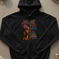 Black hoodie with "I AM BLACK. WOMAN. BEAUTIFUL. MAGICAL. INTELLIGENT. RESILIENT. LOVING. CREATIVE. POWERFUL. INFLUENTIAL. UNAPOLOGETIC." text.