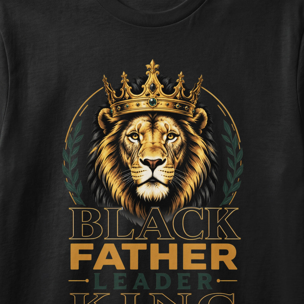 Lion wearing a crown with text "BLACK FATHER LEADER KING" on a black shirt.