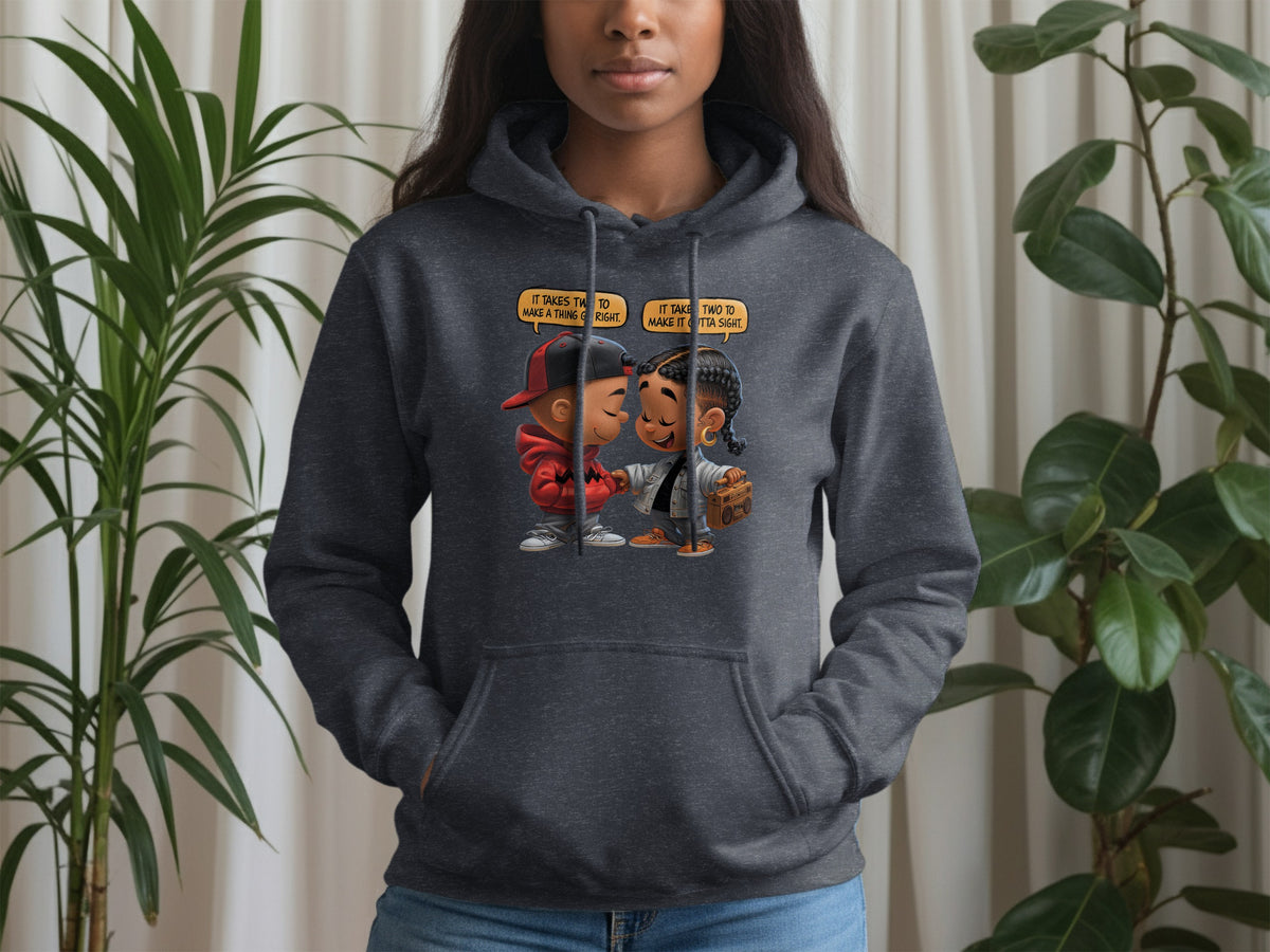 Dark grey hoodie featuring cartoon couple and text about things taking two.