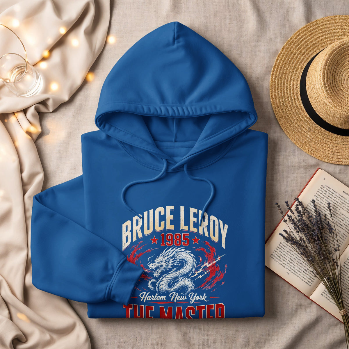 Blue hoodie with "Bruce Leroy 1985 Harlem New York The Masted" and dragon design.