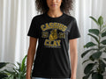 Black t-shirt with Cassius 19 64 Clay and boxing gloves graphic.