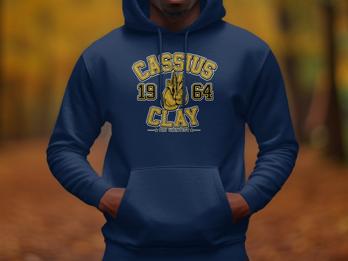 Navy blue hoodie with "Cassius 19 64 Clay The Greatest" graphic.