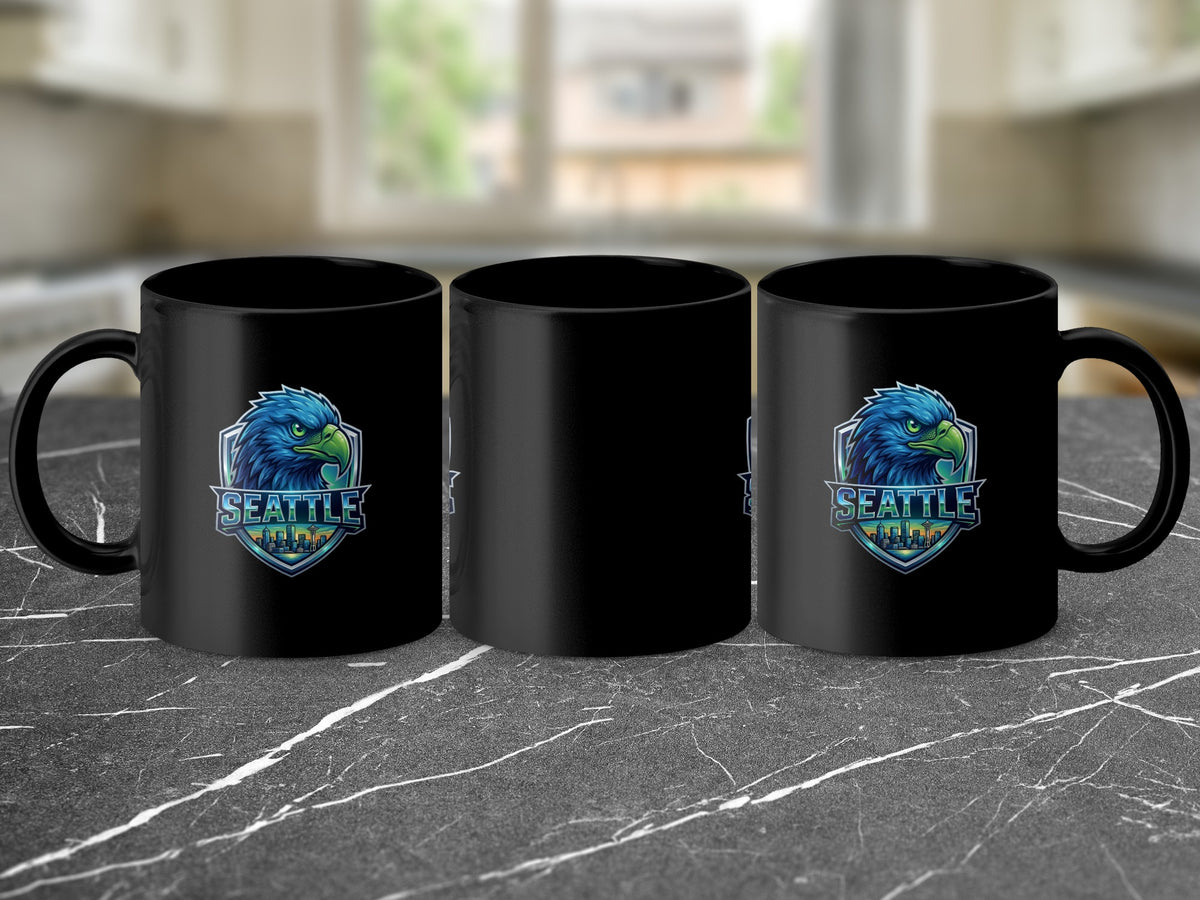 Three black mugs displayed on a dark marbled surface, each featuring a Seattle-themed eagle logo.
