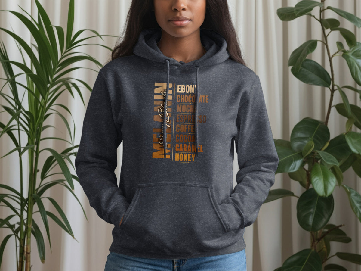 Dark grey hoodie with "Melanin" and skin tone names listed on the front.
